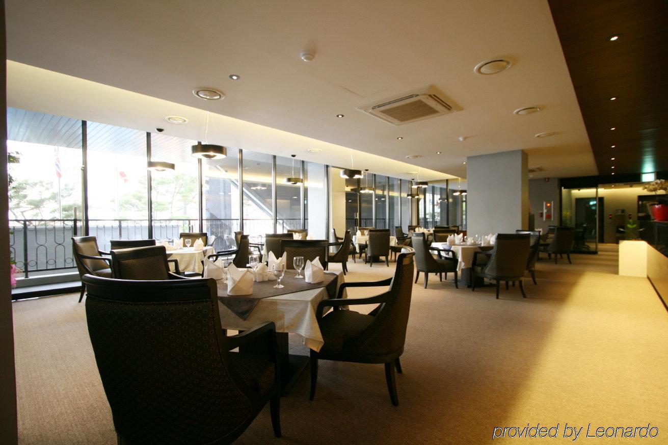 جونسان Hotel Oscar Suite المطعم الصورة